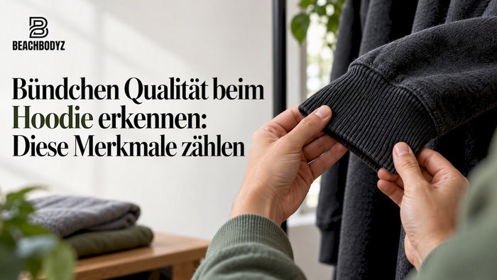 Hände ertasten das Bündchen eines Kapuzenpullovers