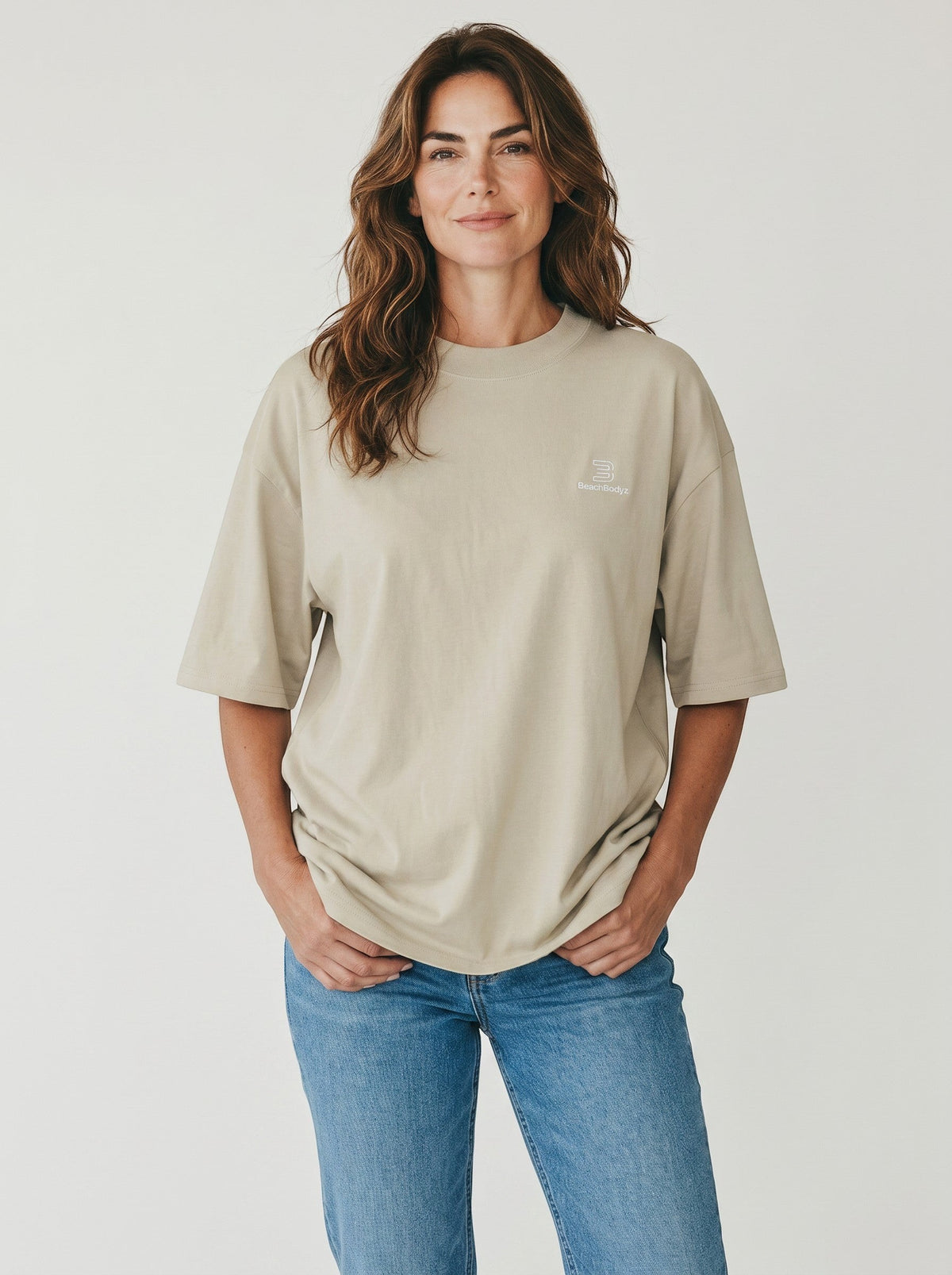 BeachBodyz® beige oversized t-shirt made from bio-cotton with a subtle embroidered logo on the chest.