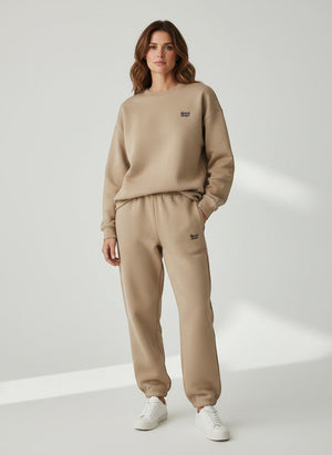 BeachBodyz® beige oversized fluffy jogging pants with elastic waistband and drawstring, side pockets.