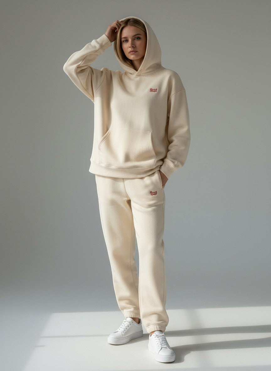 BeachBodyz® beige oversized fluffy cotton blend jogging pants with embroidered logo on left thigh.