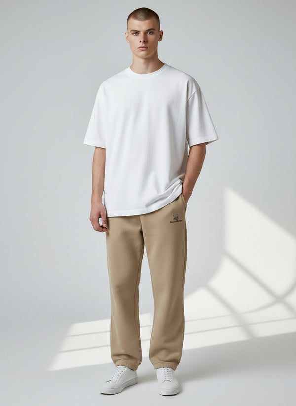 BeachBodyz® beige oversized fluffy jogginghose with elastic waistband and cuffs, and subtle logo detail.