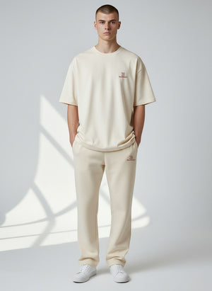 BeachBodyz® beige oversized fluffy jogginghose with drawstring waist and subtle logo embroidery.