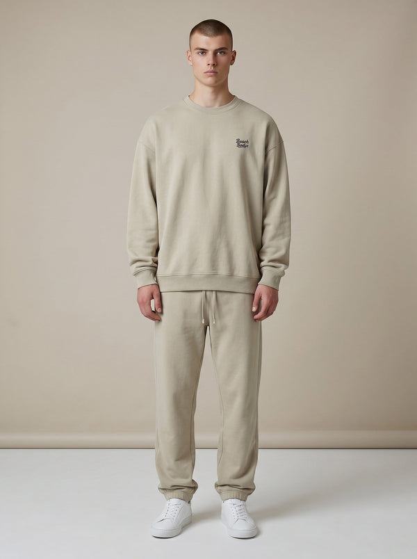 BeachBodyz® beige organic cotton oversized sweatshirt with embroidered logo on chest and ribbed cuffs.