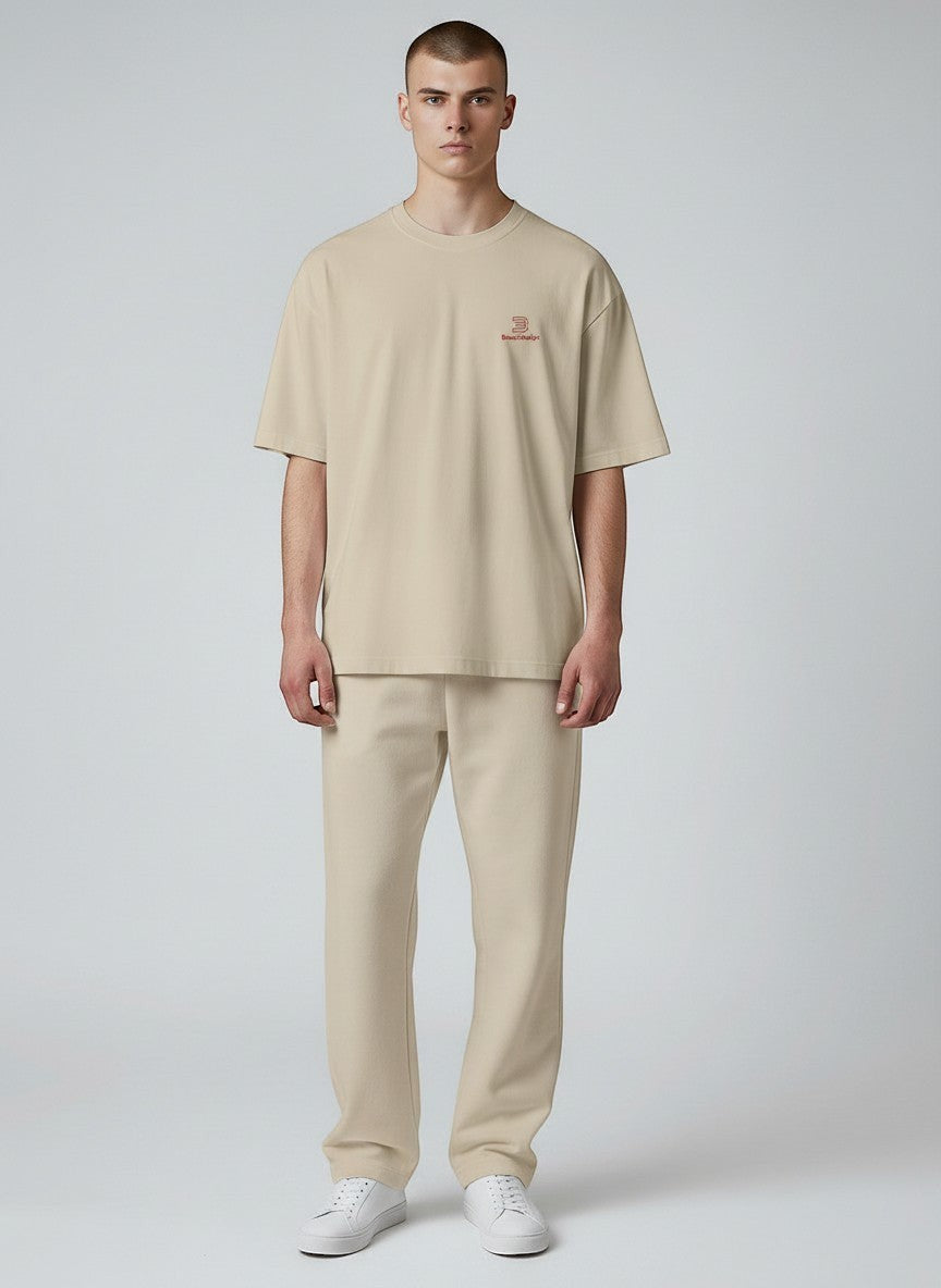 BeachBodyz® beige oversized organic cotton t-shirt with subtle red chest embroidery.