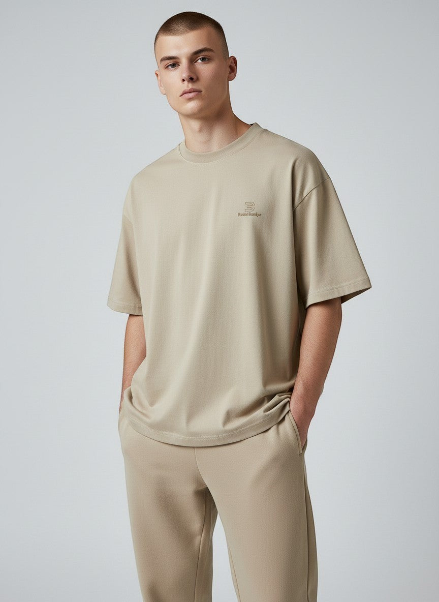 BeachBodyz® beige oversized t-shirt made from organic cotton with subtle embroidered logo on chest.