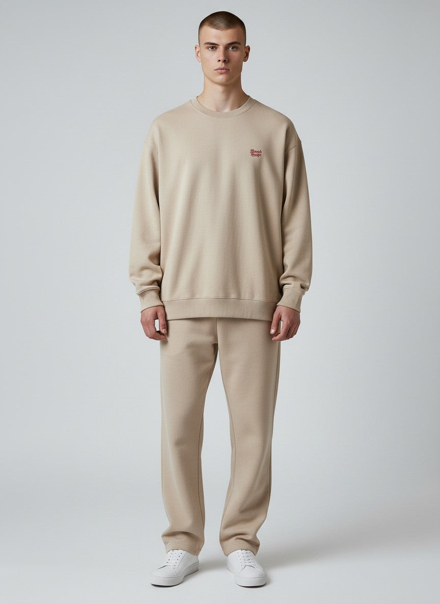 BeachBodyz® beige oversized sweatshirt made from organic cotton with a small red embroidered logo on the chest.