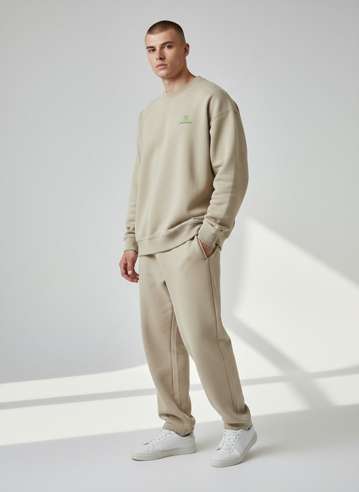 BeachBodyz® beige organic cotton oversized sweatshirt with embroidered green logo on chest.