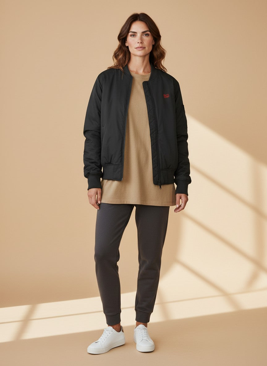 BeachBodyz® black bomber jacket with orange lining and embroidered logo. Classic streetwear style.