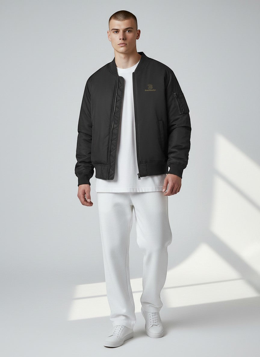 BeachBodyz® black bomber jacket for men and women with gold logo and zip pockets, ideal for streetwear.