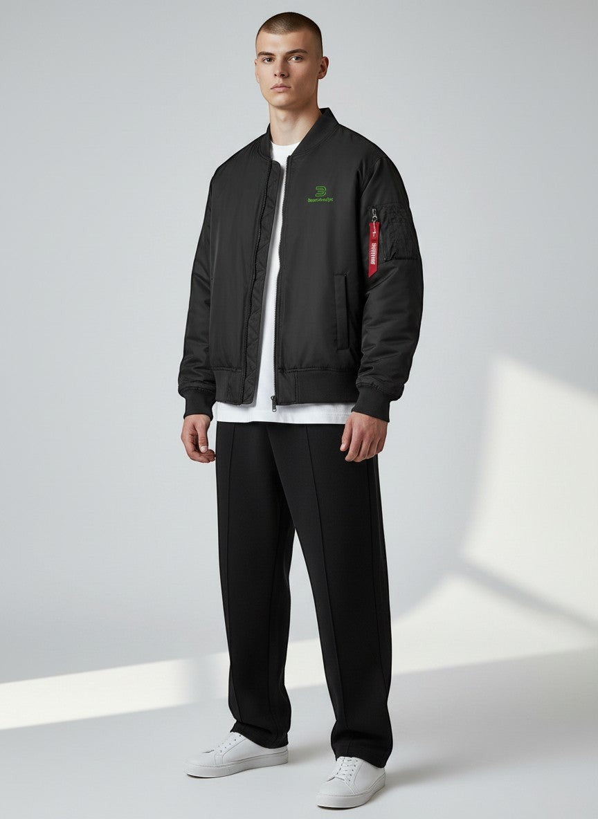 BeachBodyz® black bomber jacket with green logo, zip closure, and utility pocket on sleeve.