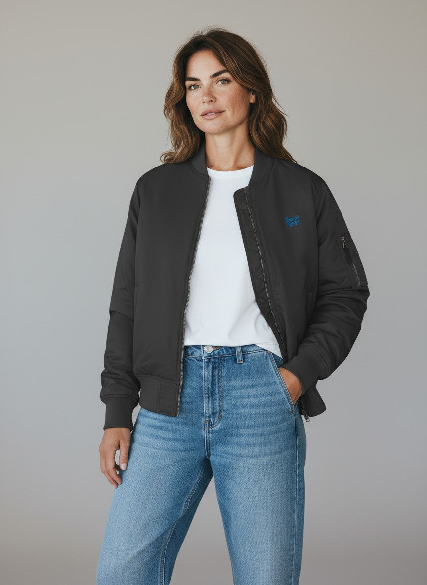 BeachBodyz® black bomber jacket with orange lining and embroidered logo. A versatile streetwear staple.