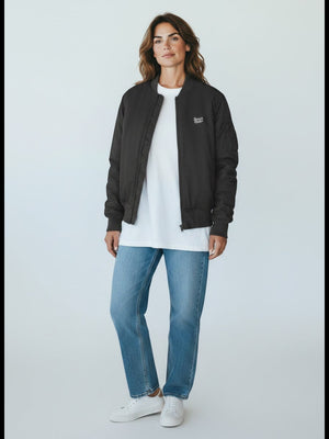 BeachBodyz® black bomber jacket with orange lining, ribbed cuffs and hem, and zippered sleeve pocket.