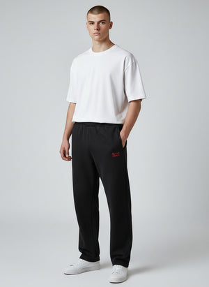 BeachBodyz® black cotton-blend jogging pants with red logo embroidery, elastic waistband, and side pockets.