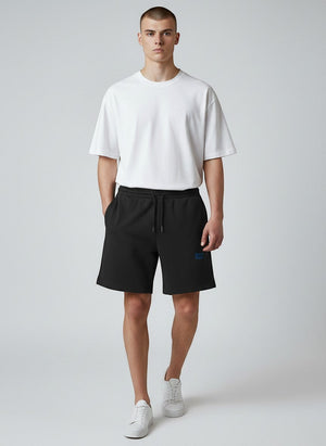 BeachBodyz® black cotton blend jogger shorts with blue embroidered logo and drawstring waist. Ideal for streetwear and casual wear.