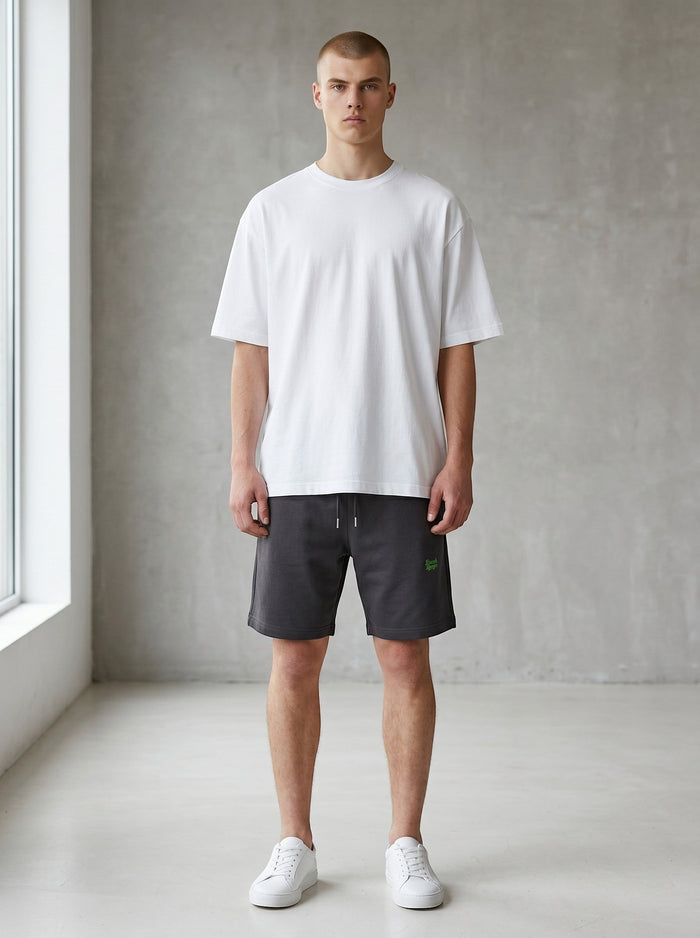 BeachBodyz® black cotton blend jogger shorts with embroidered logo and drawstring waist.