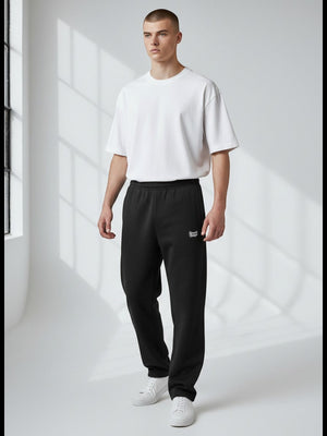 BeachBodyz black oversized fluffy jogginghose with elastic waistband and cuffs, featuring a small embroidered logo.