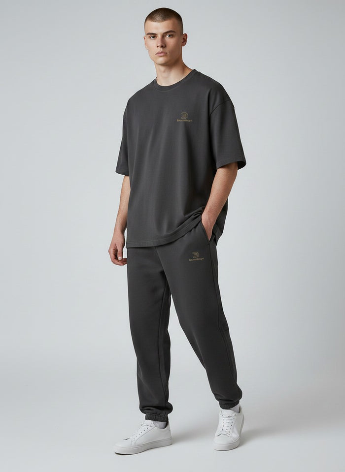 BeachBodyz® black oversized fluffy jogginghose with elastic waistband and drawstring, made from soft cotton blend.