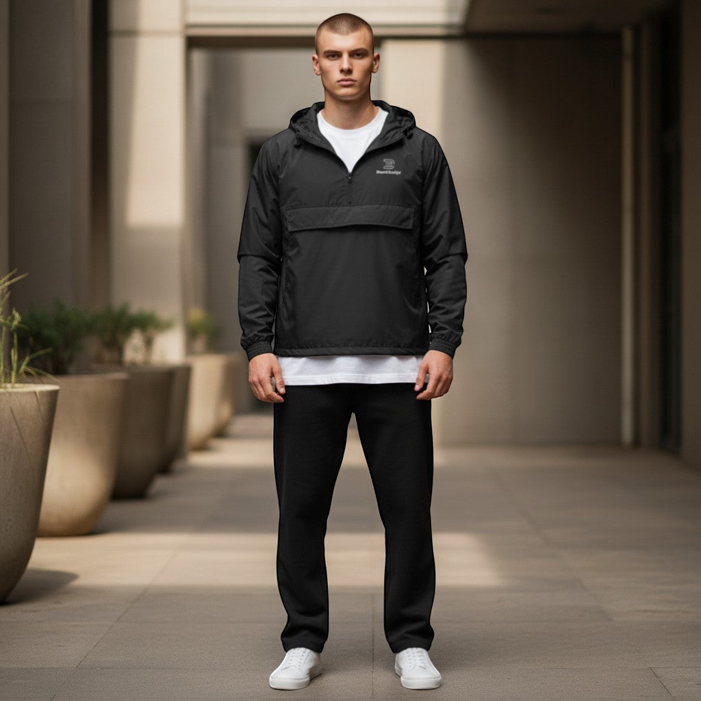 BeachBodyz® black lightweight windbreaker jacket with hood and front pouch pocket. Wind-resistant and packable.