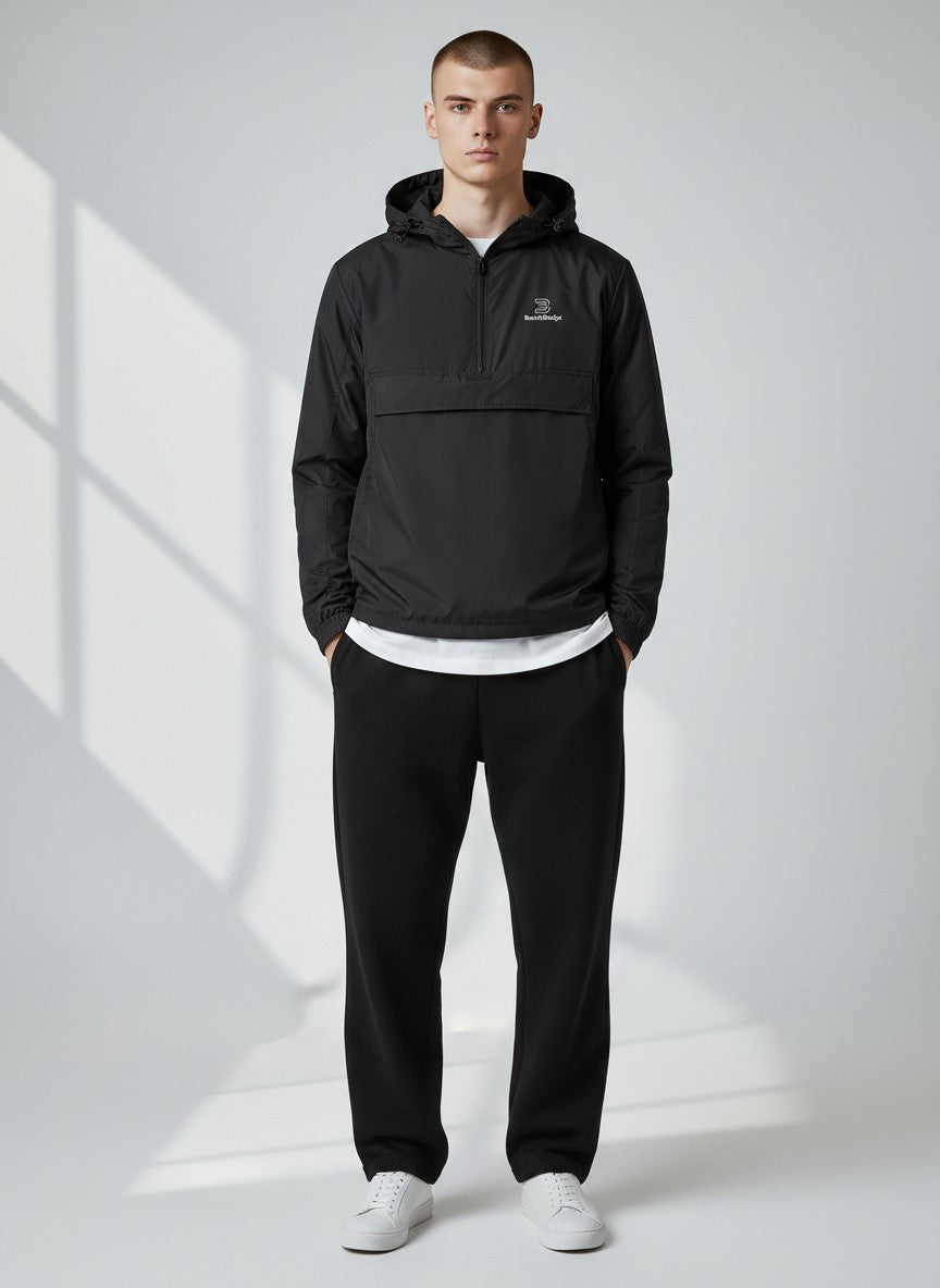 BeachBodyz® black lightweight windbreaker jacket with hood and quarter zip, featuring a small logo on the chest.