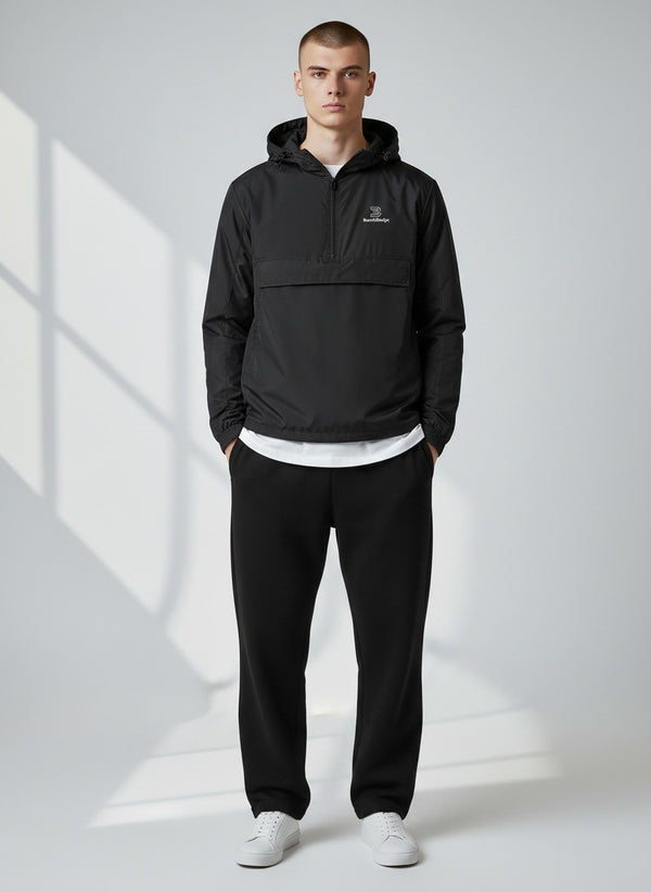 BeachBodyz® black lightweight windbreaker jacket with hood and quarter zip, featuring a small logo on the chest.