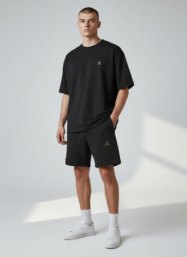BeachBodyz® black organic cotton jogger shorts with embroidered logo and drawstring waist. Ideal for streetwear.