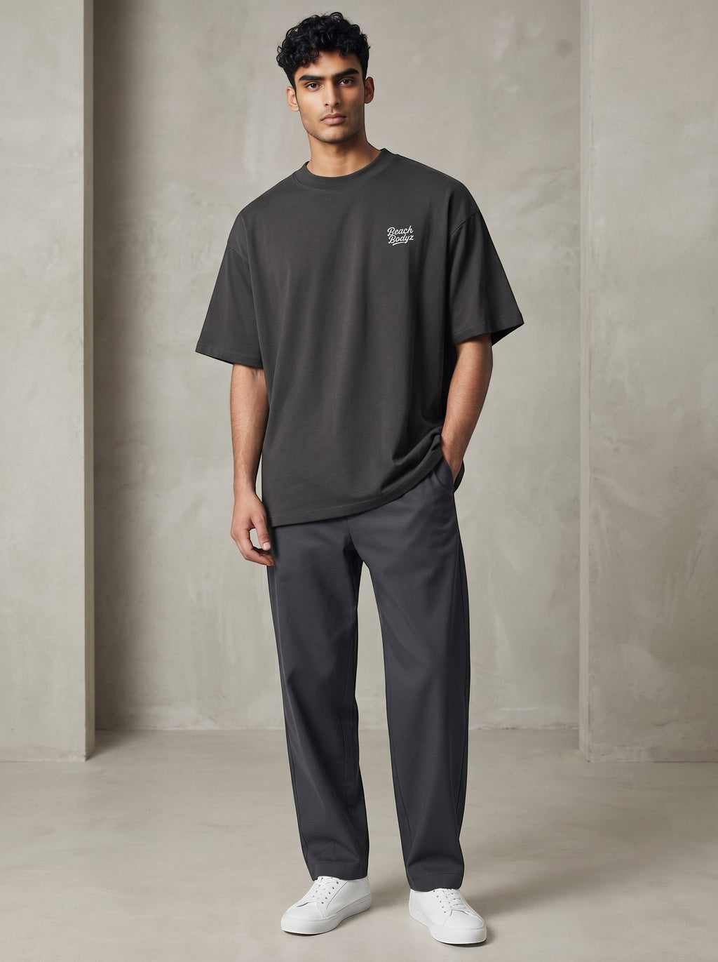 BeachBodyz® black oversized 100% organic cotton t-shirt with subtle chest embroidery and crew neck.