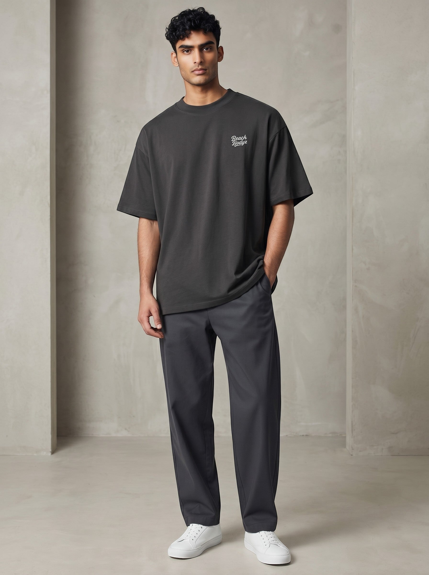 BeachBodyz® black oversized 100% organic cotton t-shirt with subtle chest embroidery and crew neck.