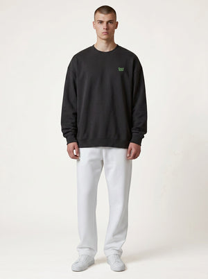 BeachBodyz® black oversized sweatshirt made from organic cotton with a small embroidered neon green logo on the chest.