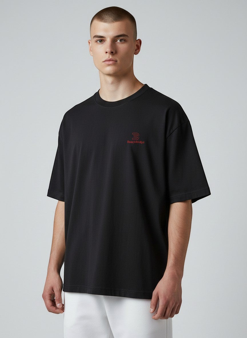 BeachBodyz® black oversized t-shirt made from organic cotton with a small red embroidered logo on the chest.