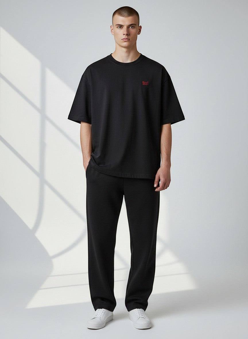 BeachBodyz® black oversized t-shirt made from 100% organic cotton with a small red embroidered logo on the chest.