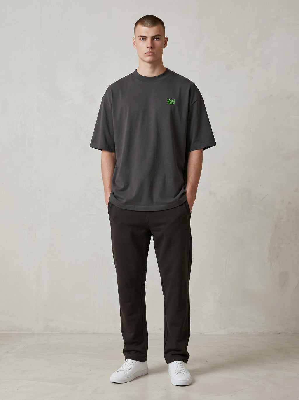BeachBodyz® black oversized t-shirt made from organic cotton with a small green embroidered logo on the chest.