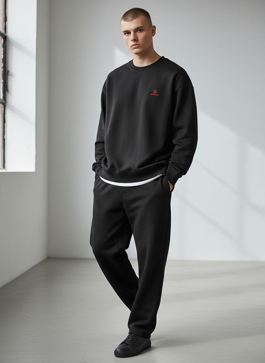 BeachBodyz® black oversized sweatshirt made from bio-cotton with a small red embroidered logo on the chest.