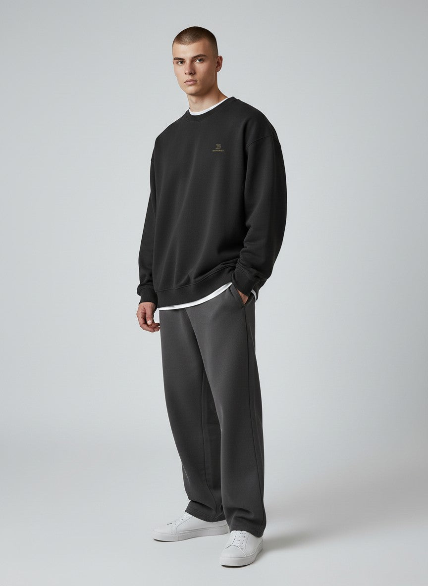 BeachBodyz® black oversized sweatshirt made from organic cotton with a small embroidered logo on the chest.