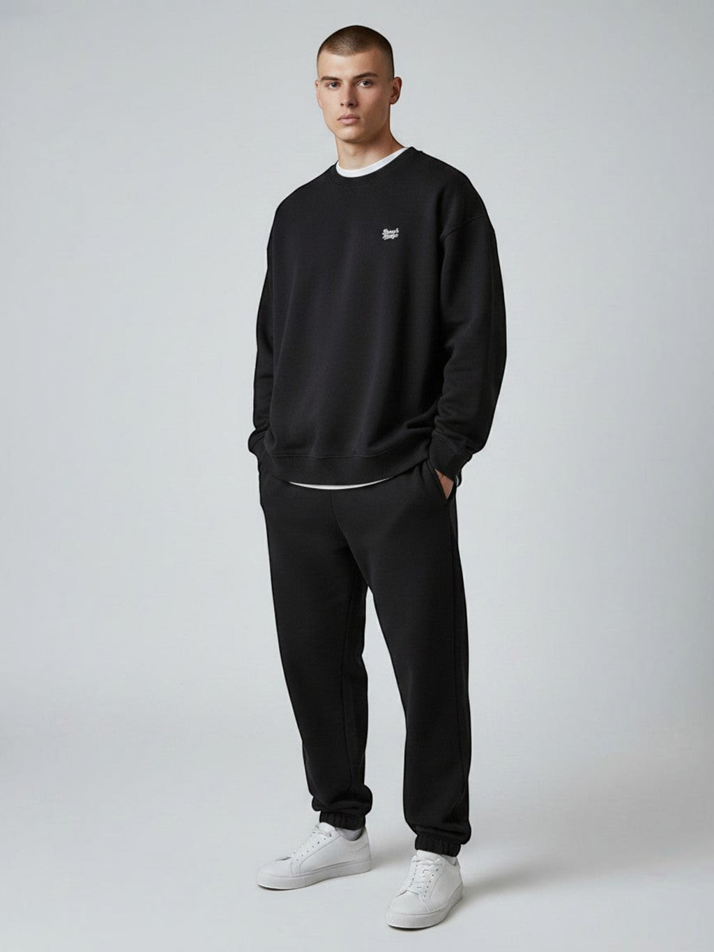 BeachBodyz® black oversized sweatshirt made from organic cotton with a small embroidered logo on the chest.