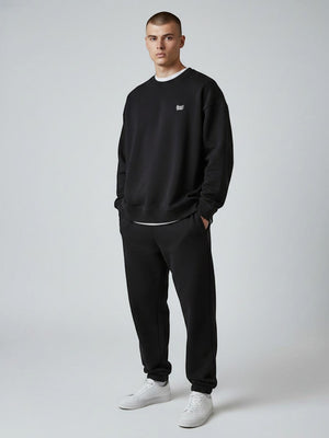BeachBodyz® black oversized sweatshirt made from organic cotton with a small embroidered logo on the chest.