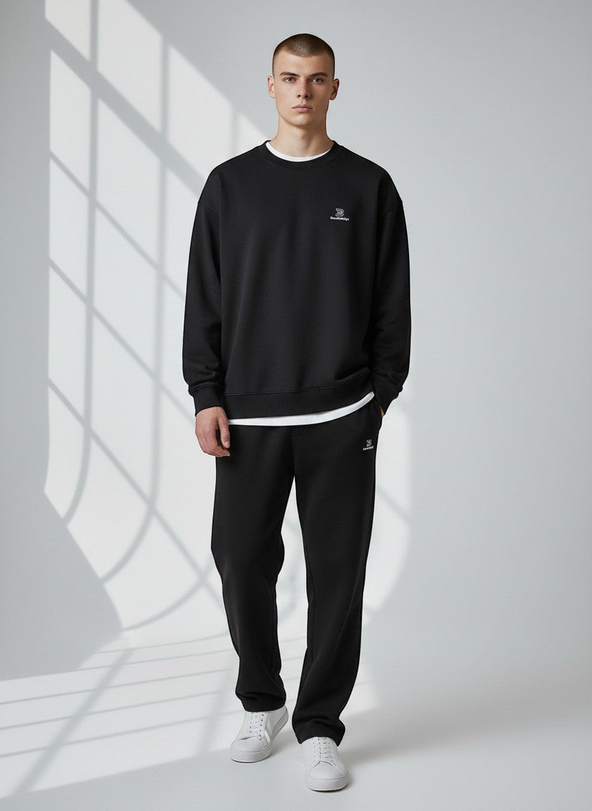 BeachBodyz® black oversized sweatshirt made from organic cotton with a small embroidered logo on the chest.