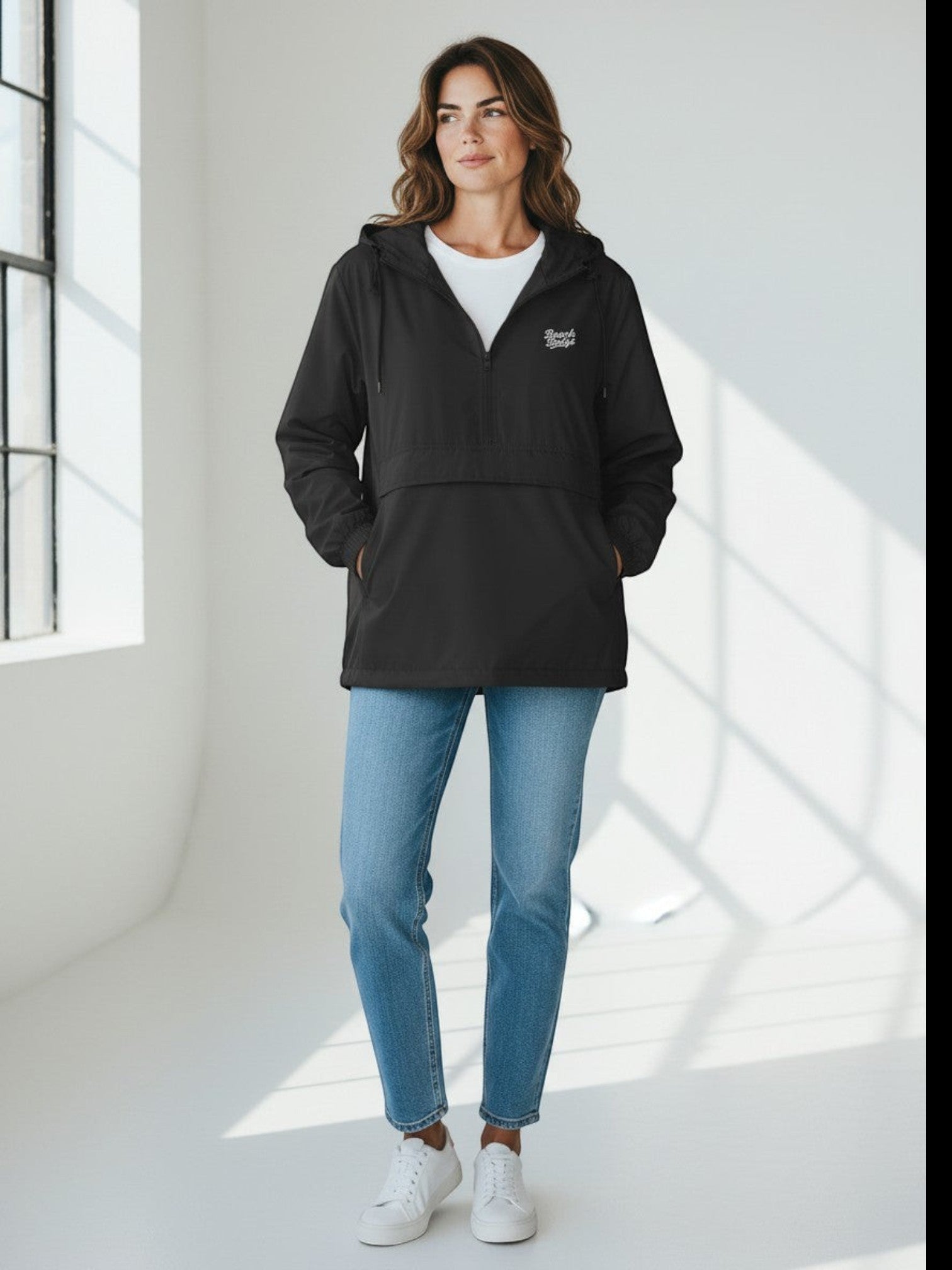 BeachBodyz® black lightweight windbreaker jacket with hood and front pouch pocket, ideal for urban streetwear.