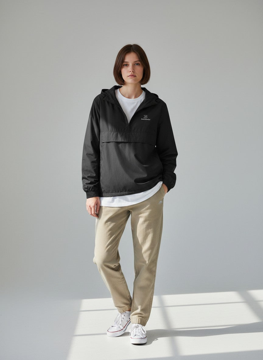 BeachBodyz® black lightweight windbreaker jacket with hood and quarter zip, featuring a small logo on the chest.