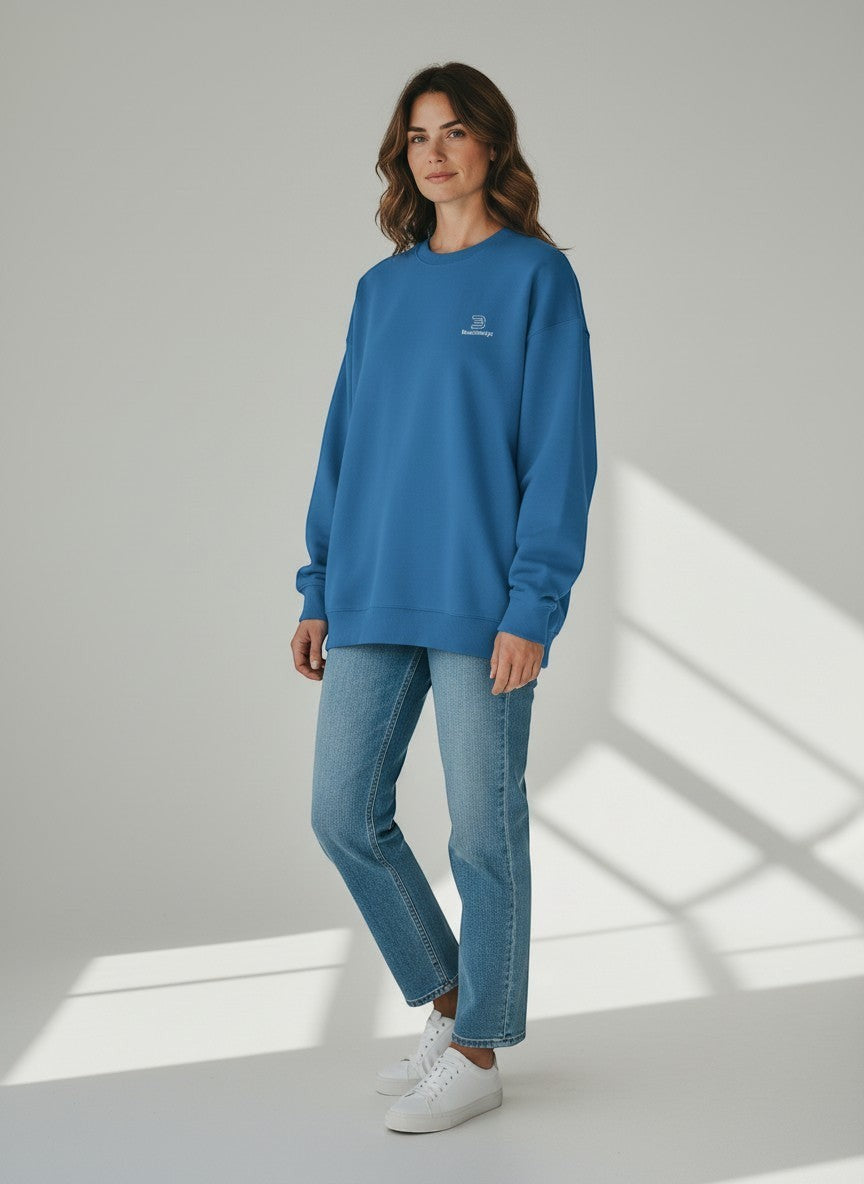 BeachBodyz® blue oversized sweatshirt made from bio-cotton with a small embroidered logo on the chest.