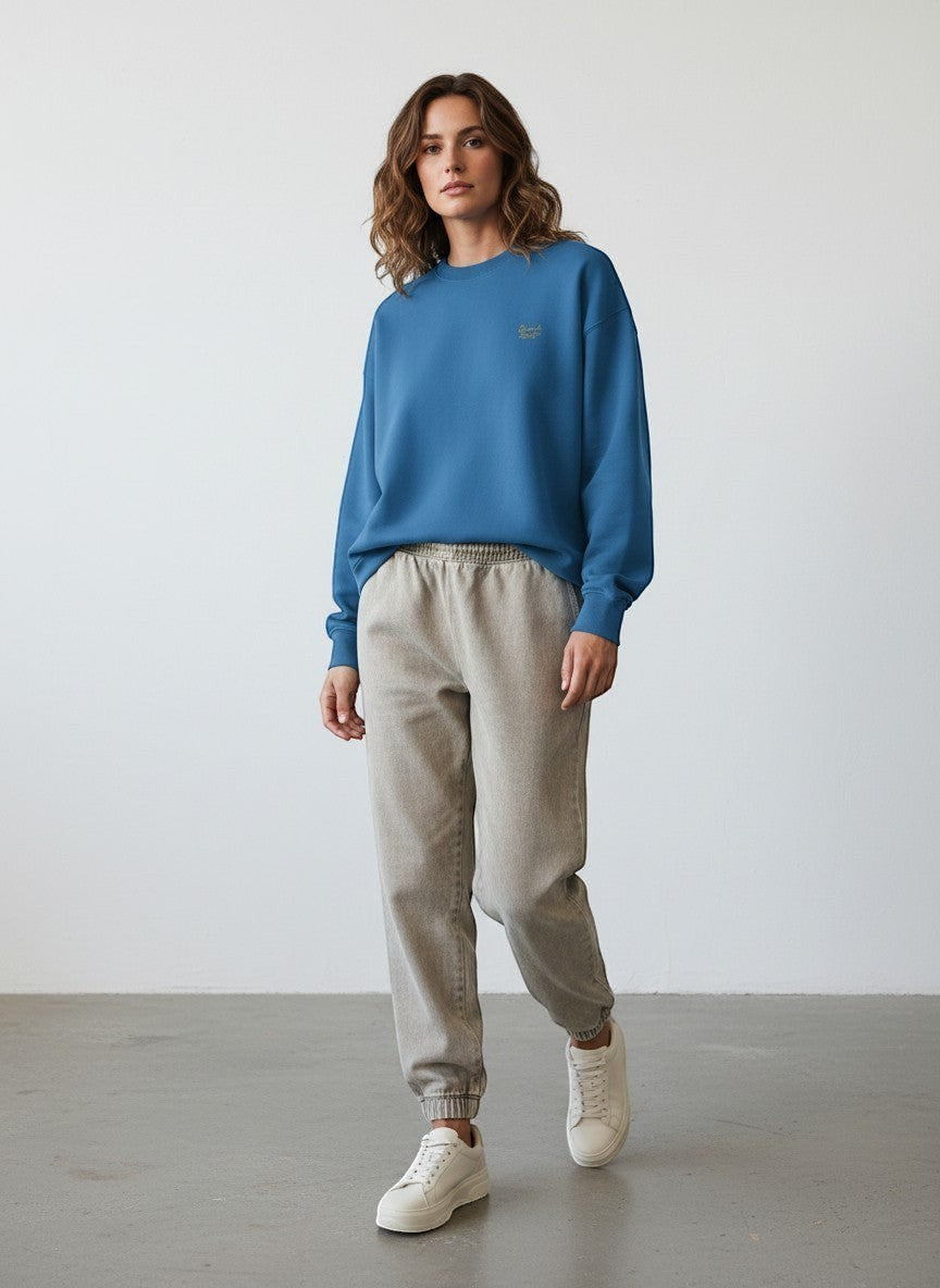 BeachBodyz® blue oversized sweatshirt made from organic cotton with a small embroidered logo on the chest.