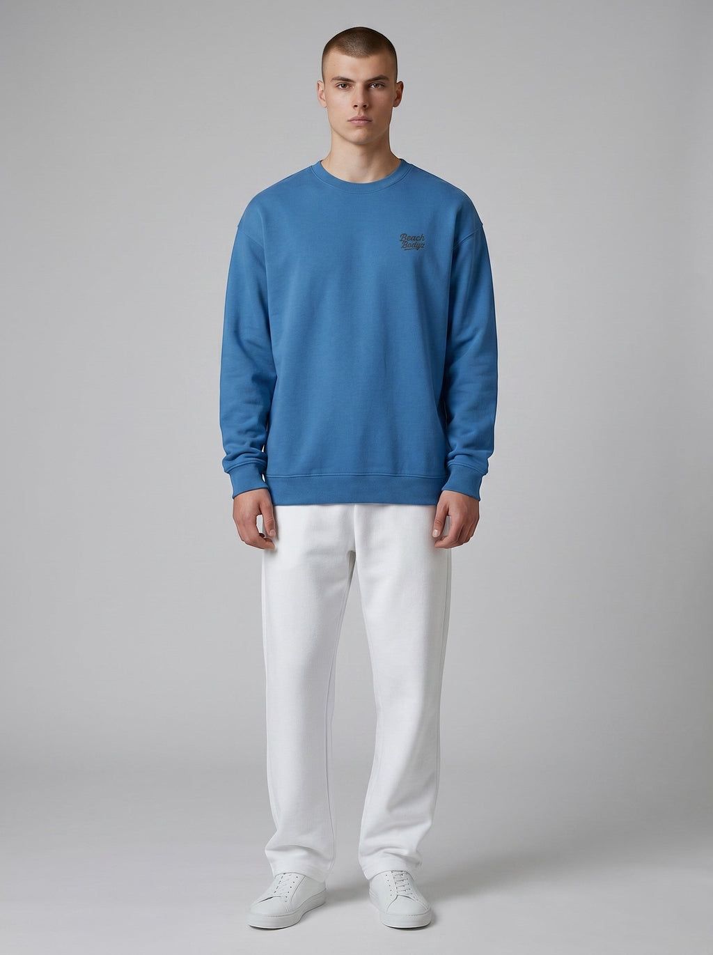 BeachBodyz® blue oversized sweatshirt made from organic cotton with embroidered logo on chest.