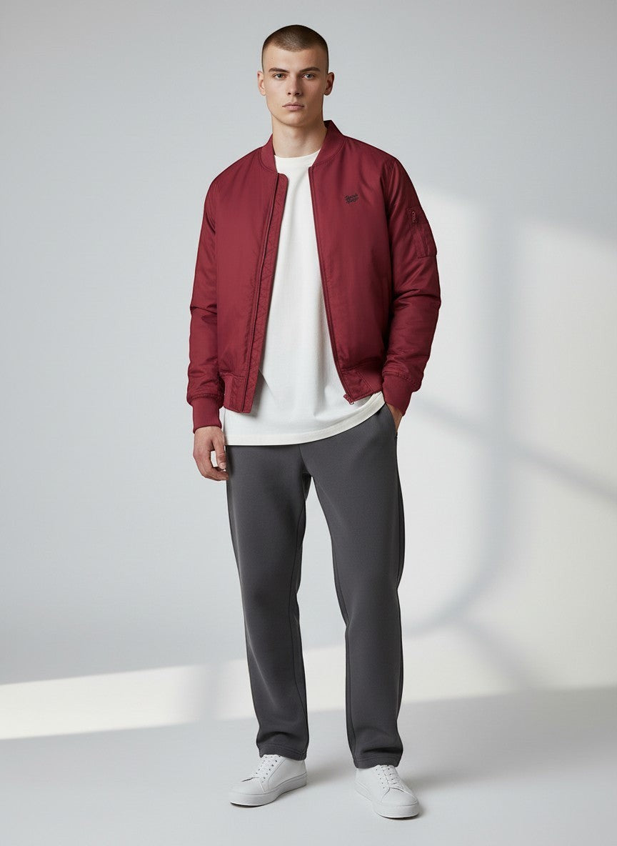 BeachBodyz® burgundy bomber jacket for men and women, classic streetwear style with zip closure and ribbed cuffs.