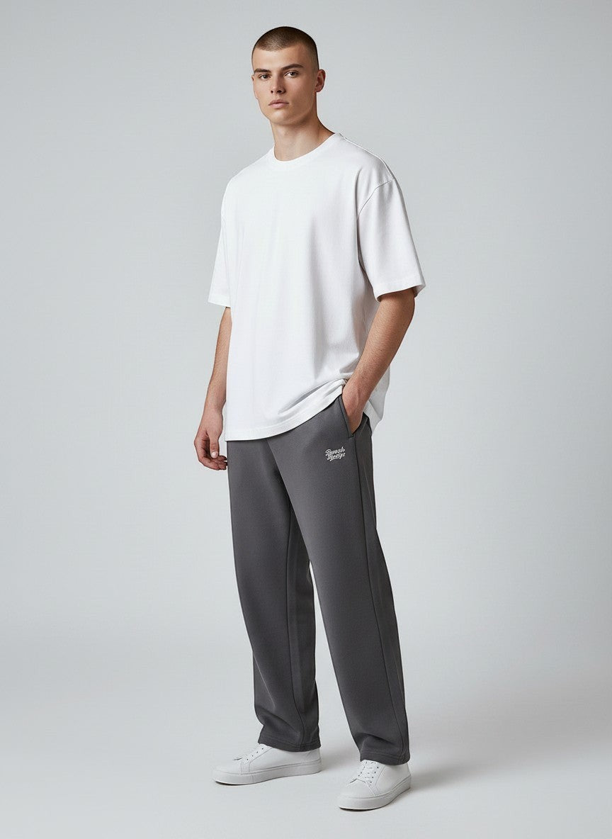 BeachBodyz® charcoal grey cotton blend jogging pants with elastic waistband and subtle logo embroidery.