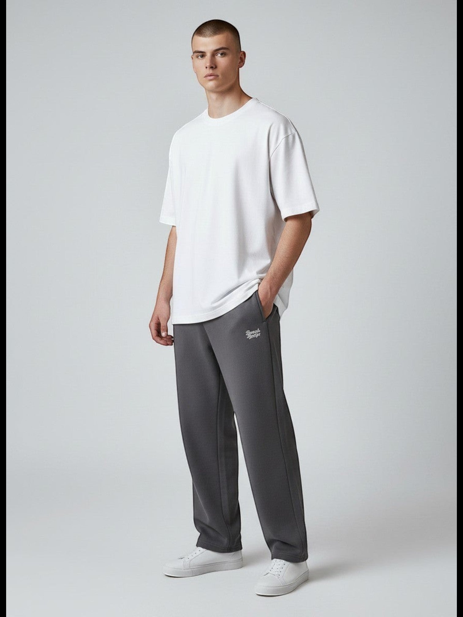 BeachBodyz® charcoal grey cotton blend jogging pants with elastic waistband and subtle logo embroidery.