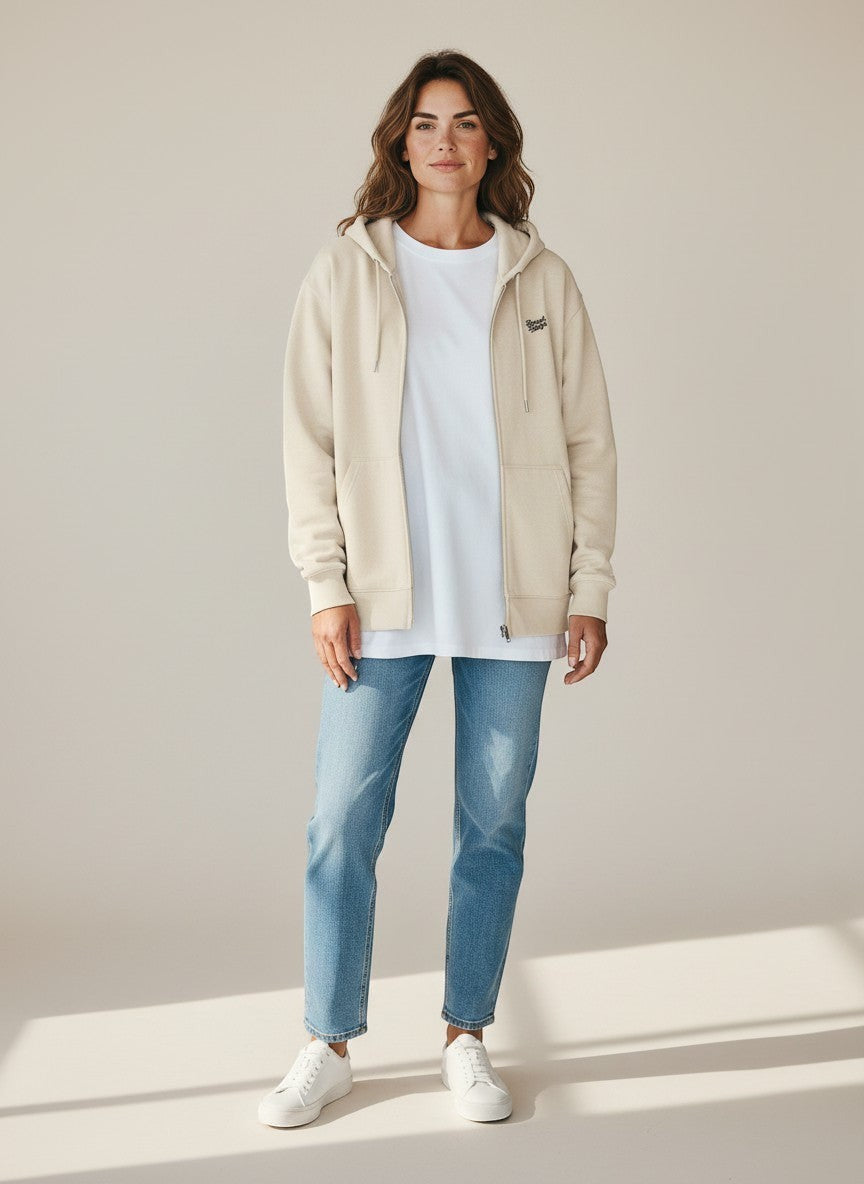 BeachBodyz® cream organic cotton zip-up hoodie with embroidered logo and front pockets.