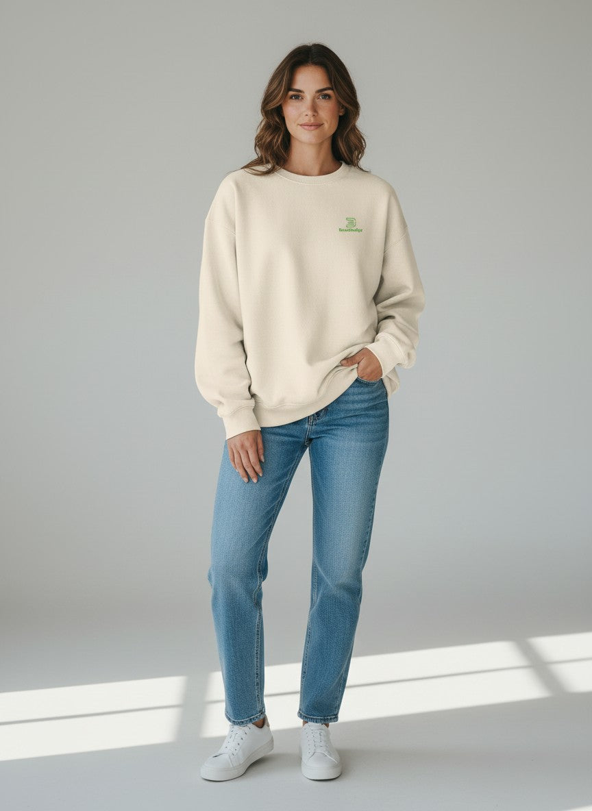 BeachBodyz® cream organic cotton oversized sweatshirt with green embroidered logo on chest.