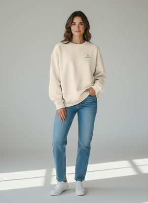 BeachBodyz® cream organic cotton oversized sweatshirt with green embroidered logo on chest.