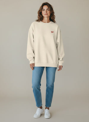BeachBodyz® cream oversized sweatshirt made from organic cotton with a small red embroidered logo on the chest.