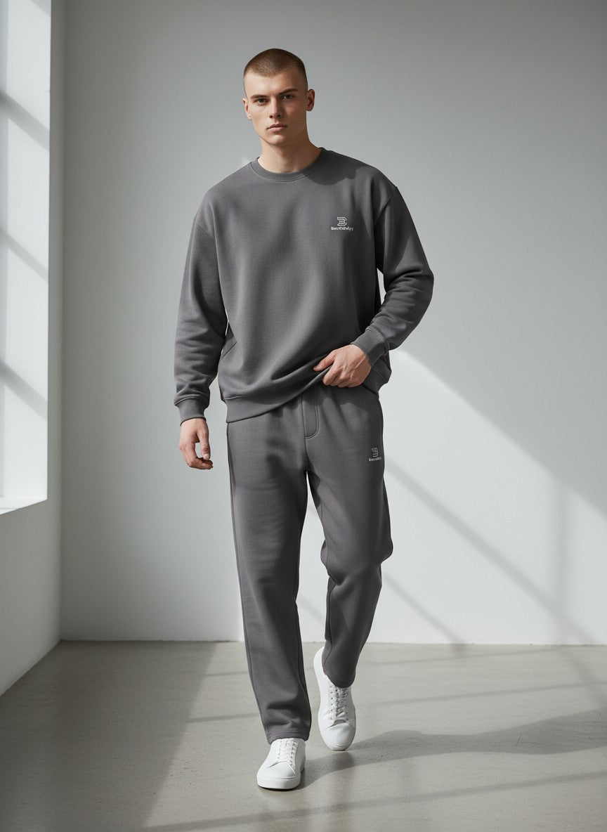 BeachBodyz® dark grey cotton blend jogging pants with elastic waistband and subtle logo.