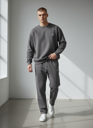 BeachBodyz® dark grey cotton blend jogging pants with elastic waistband and subtle logo.